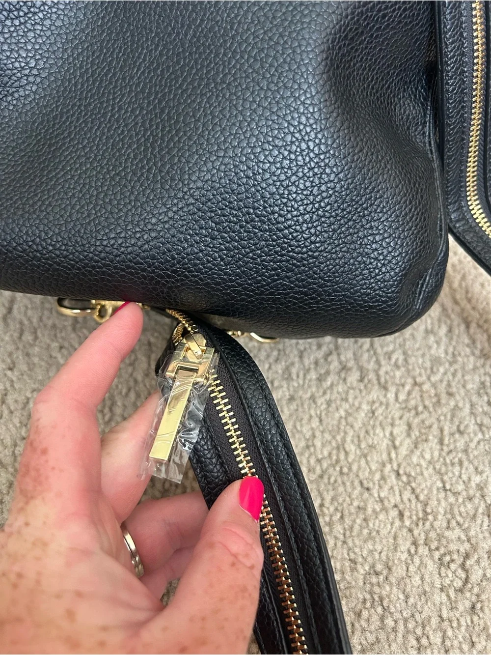 Halston Black Pebbled Leather Drawstring Backpack with Gold Accents